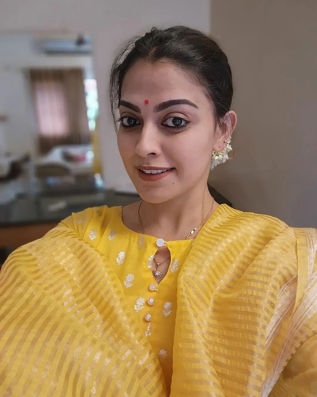 Anusree Nair In South Indian Traditional Yellow Gown